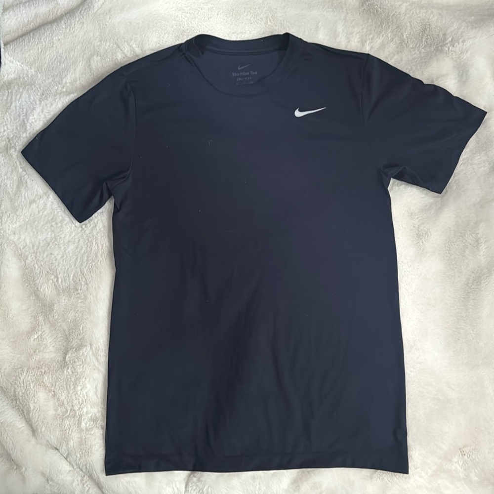 Men’s Navy blue dri-fit short sleeve shirt.
